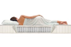 Woman sleeping on mattress